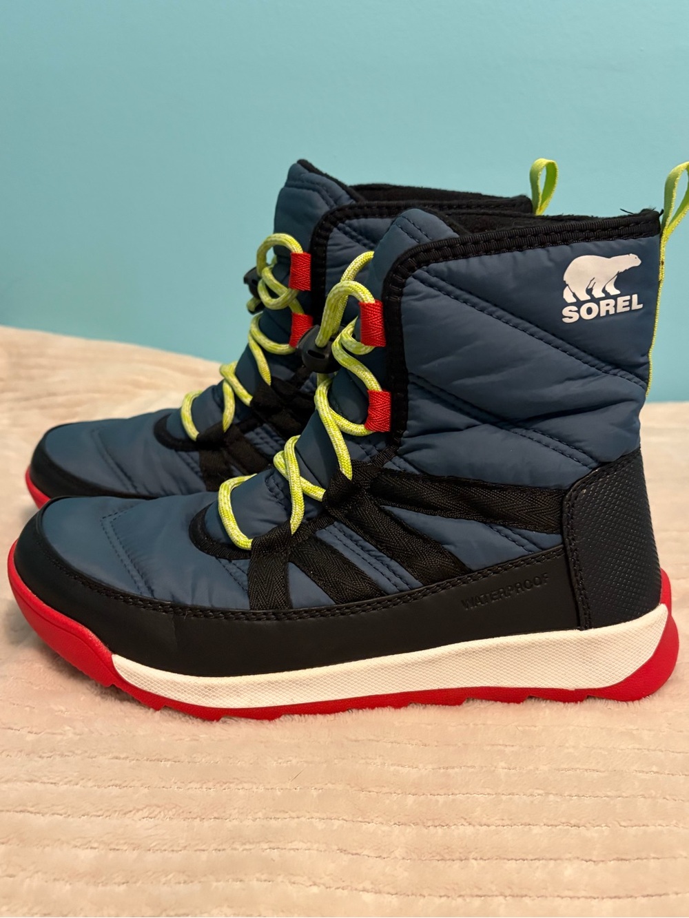 Sorel Kids Whitney II Blue Winter Boots with Red Sole and Yellow Laces